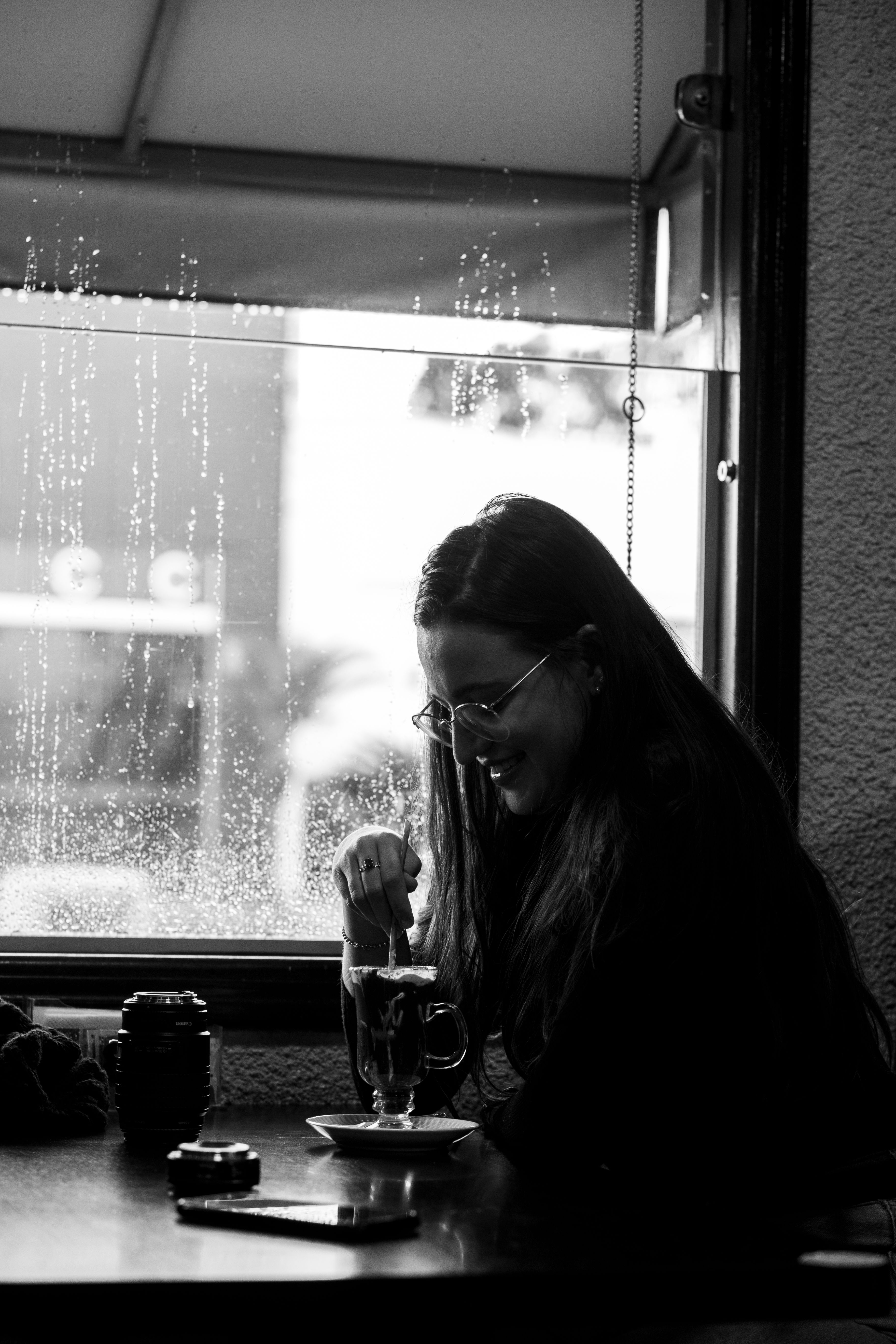 Woman Sitting by the Window · Free Stock Photo