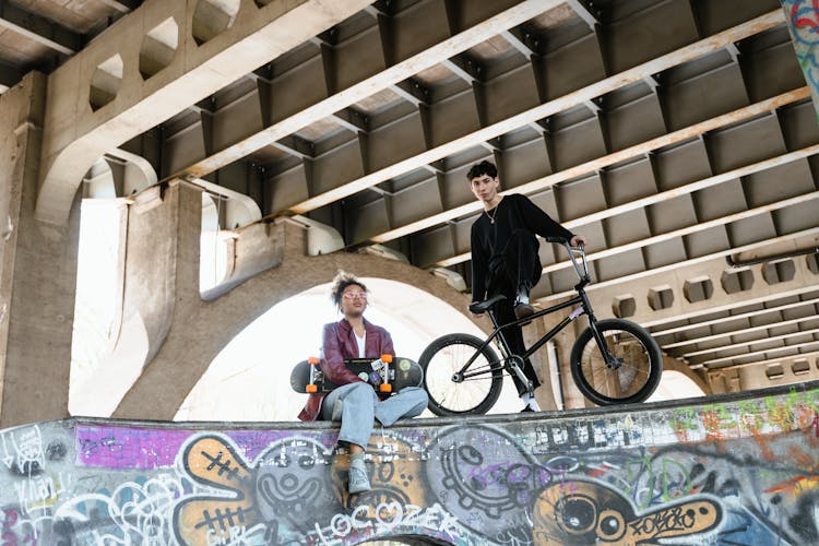 Man And Woman At A Skatepark