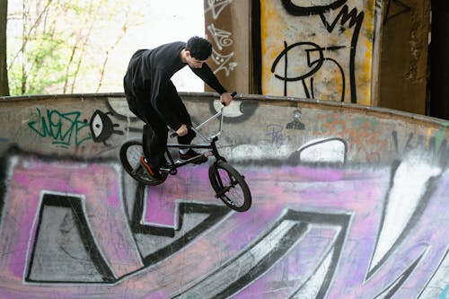 Free Man Doing Bike Tricks Stock Photo