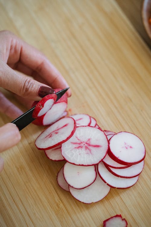Knife Cutting Radish · Free Stock Photo