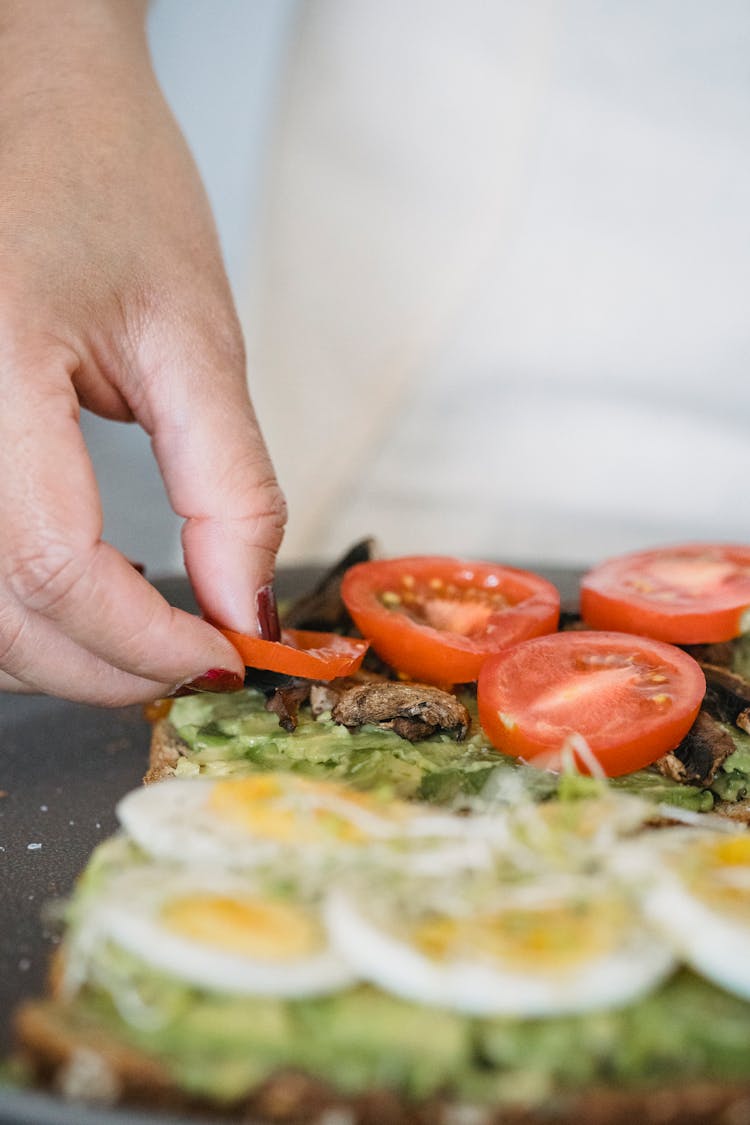 Woman Preparing Sandwiches For Breakfast