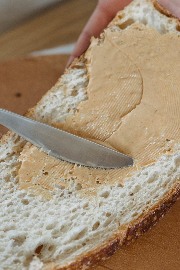 Peanut Butter Spread On A Slice Of Bread