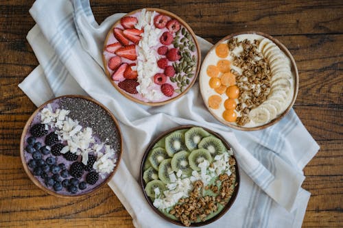 Free Healthy Breakfast Bowls on a Wooden Surface Stock Photo