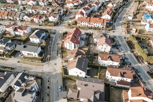 Aerial view of a suburban neighborhood with charming houses and clean streets.