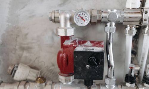 Pressure gauge on industrial plumbing pipes