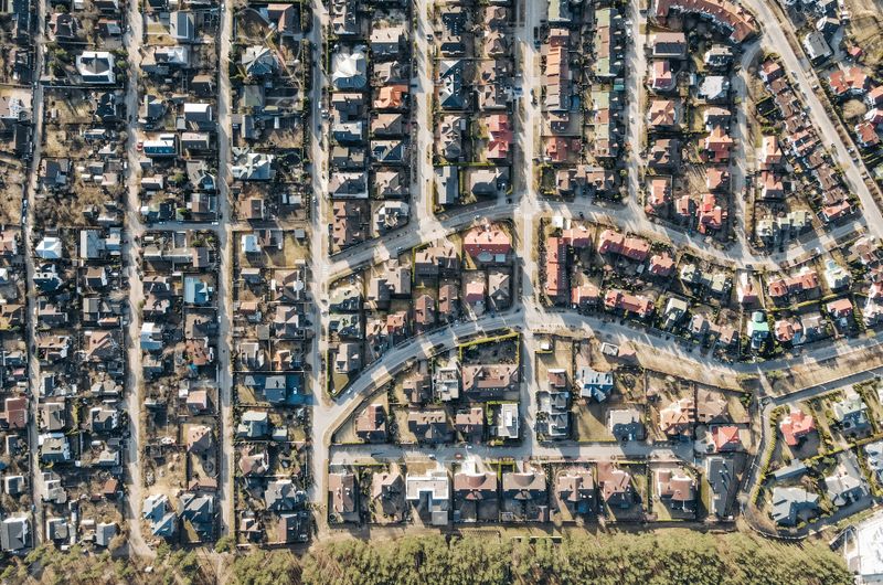 Aerial photograph showing residential streets, separate properties and gardens