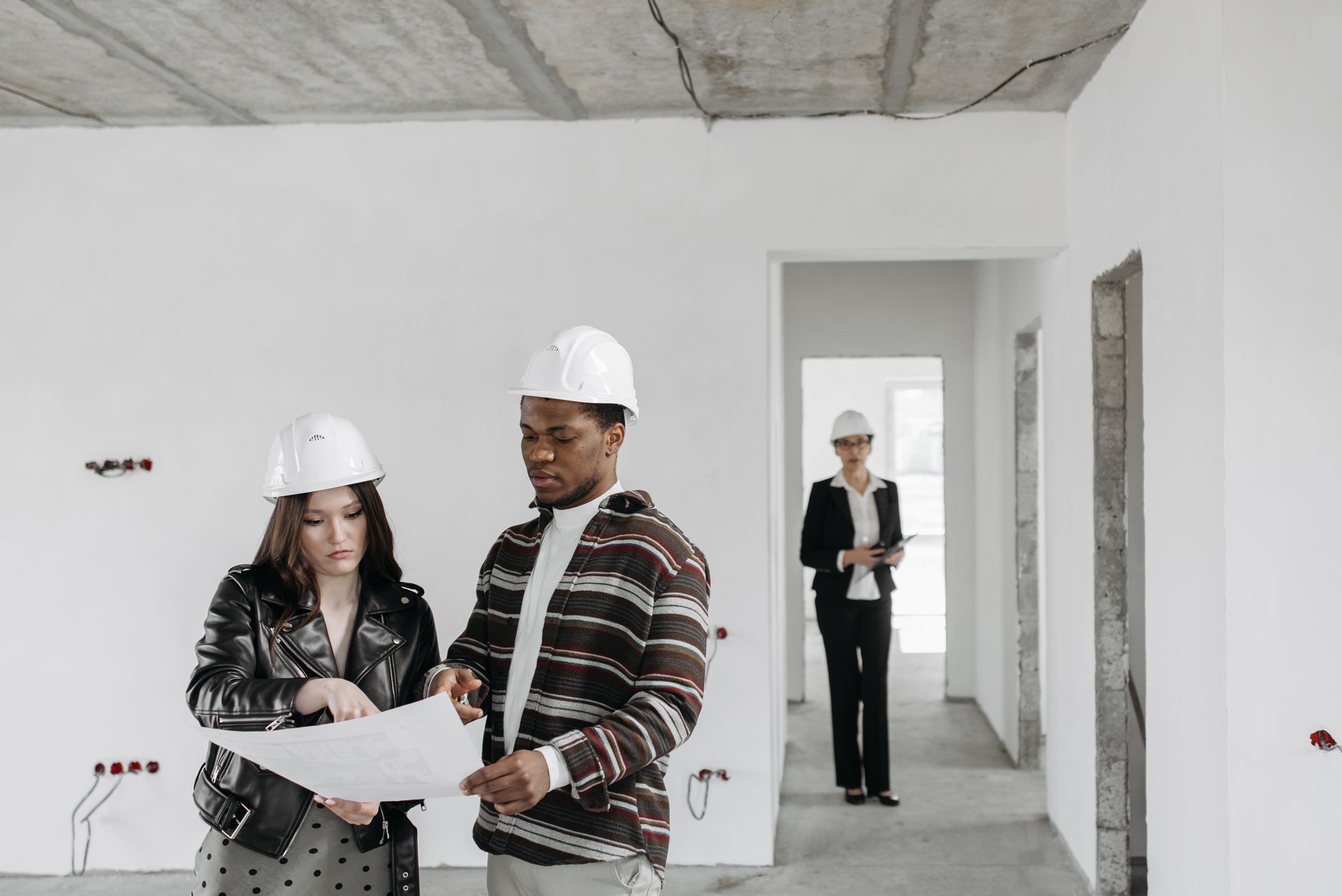 A Couple Looking at the Blue Print