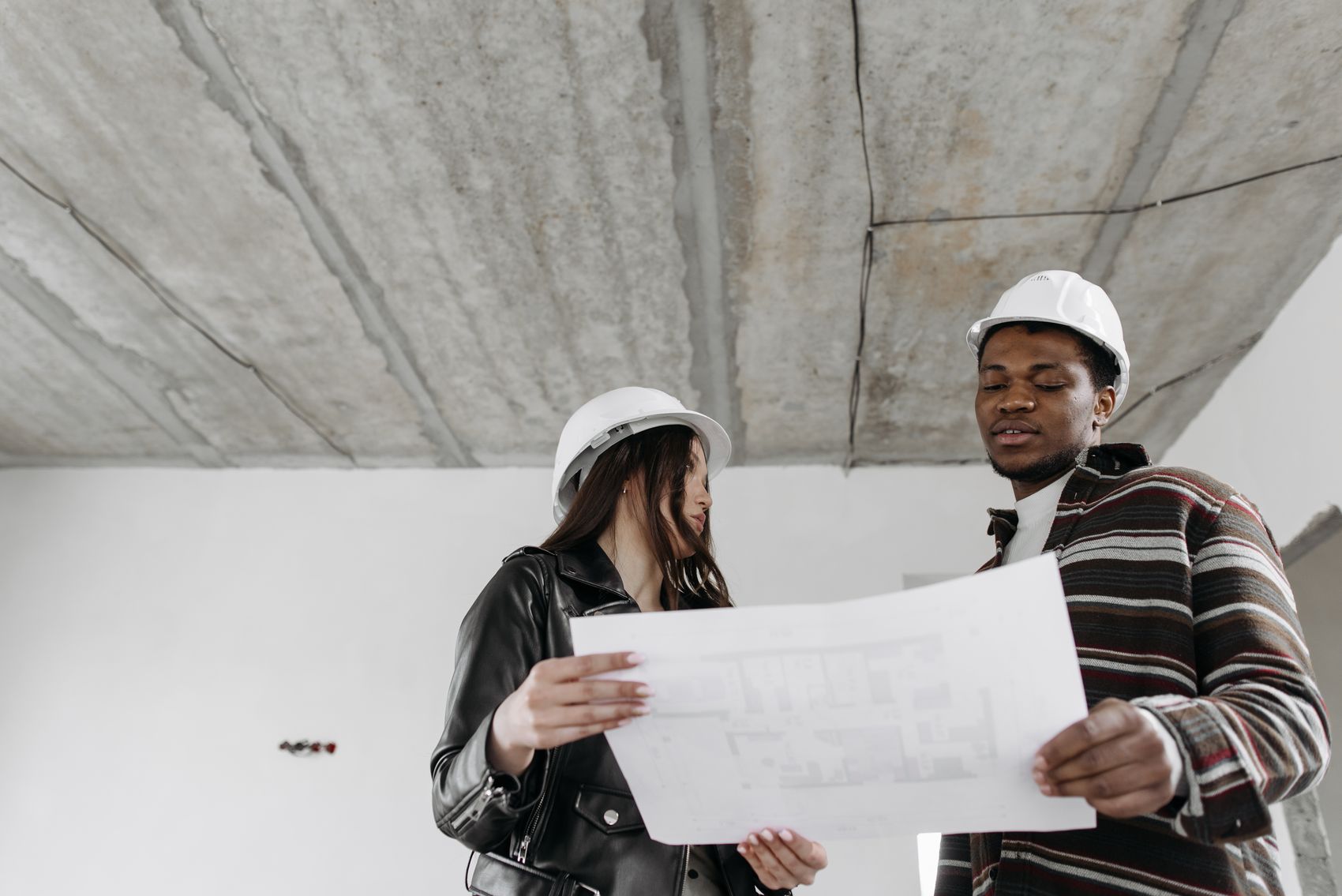 Building professionals reviewing residential plans