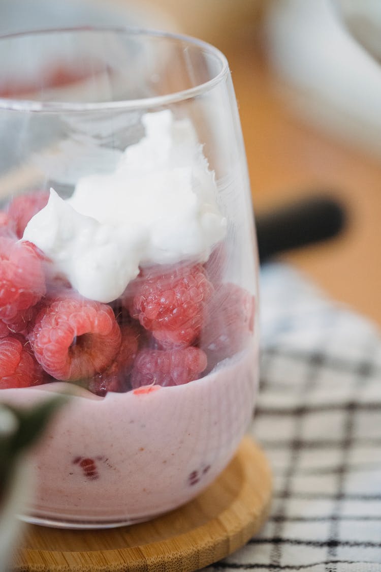 Close-up Of Smoothie With Fruits In Glass