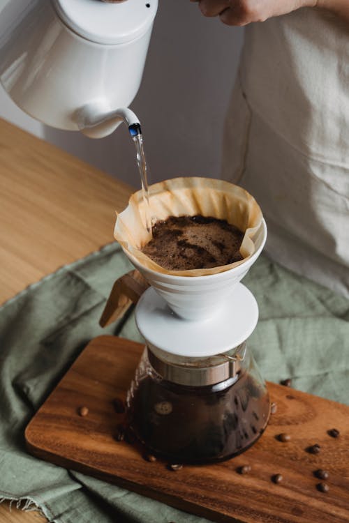 傾注, 咖啡磨豆機, 垂直拍摄 的 免费素材图片