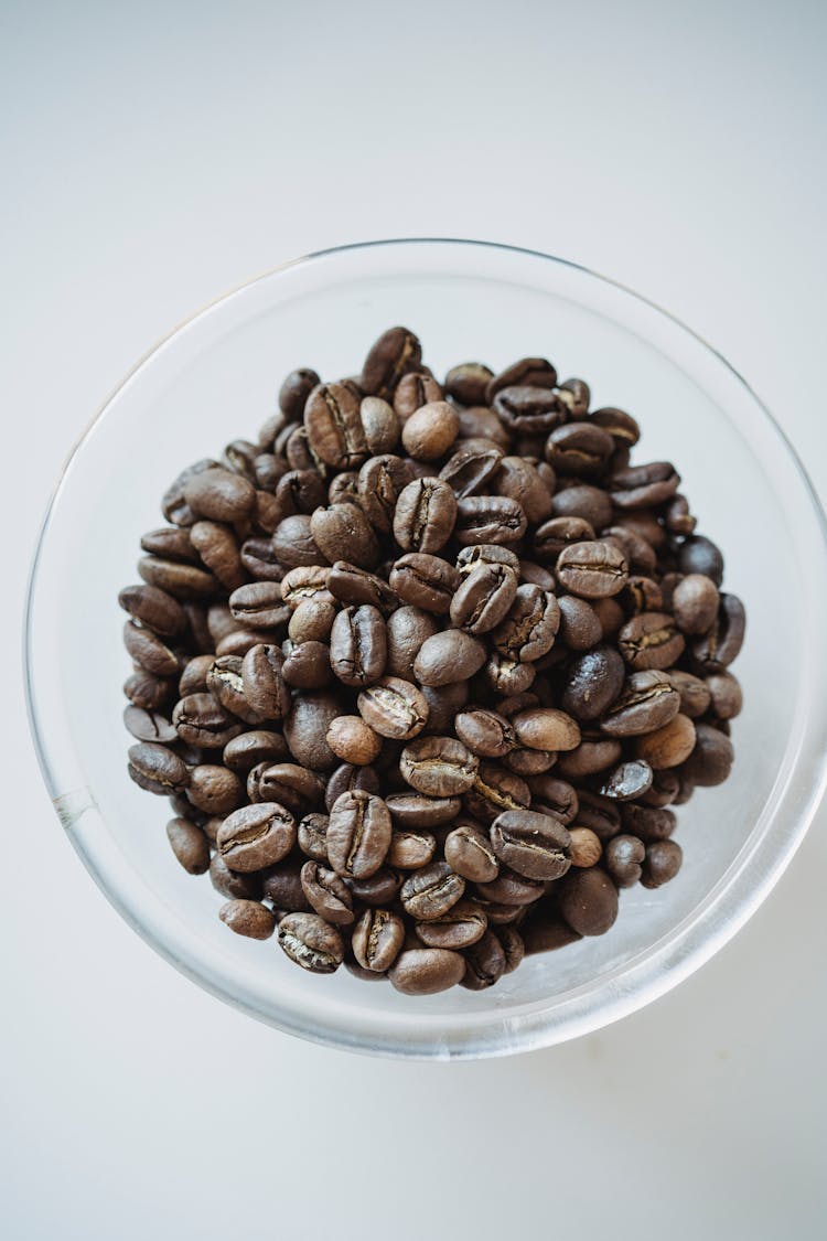 Brown Coffee Beans On Clear Glass Bowl
