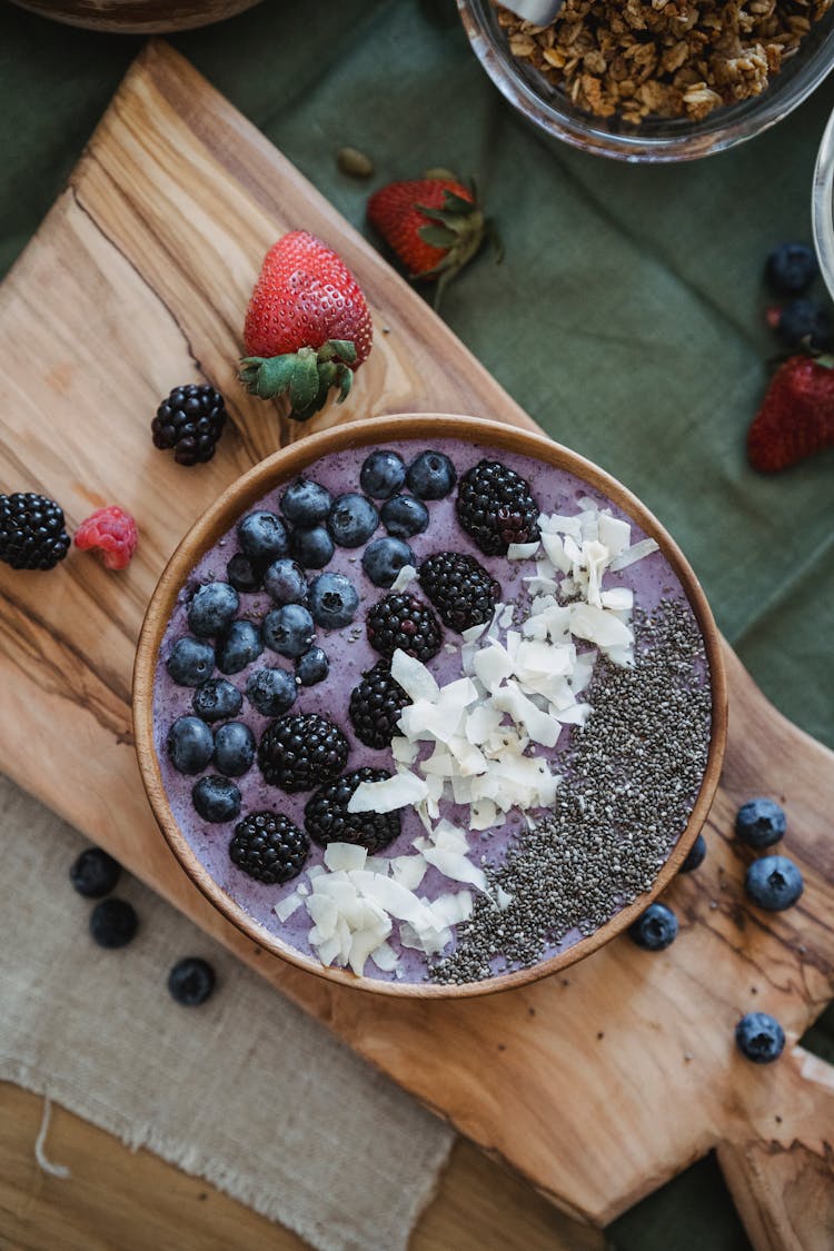 Dessert Made Of Berries On Brown Wooden Bowl