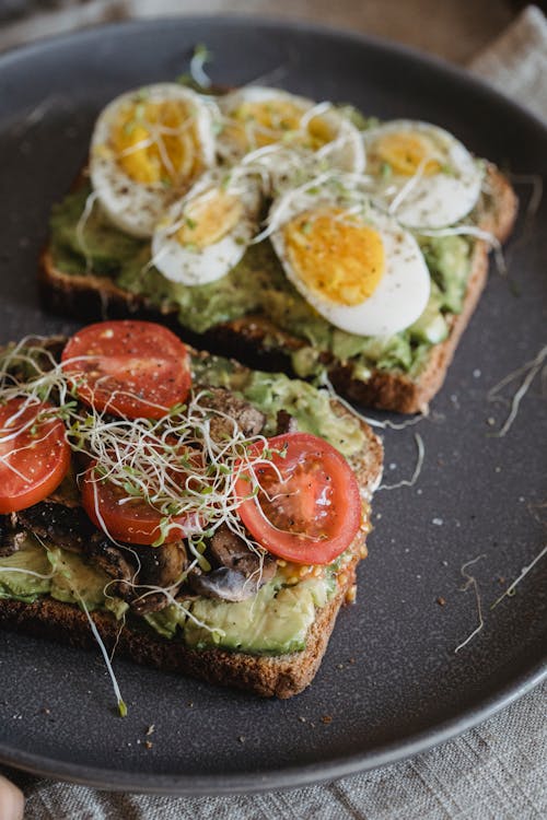 Free Variants of Avocado Toasts with Alfalfa Stock Photo