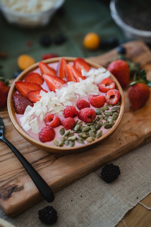 Berries with Nuts and Cream on Round Bowl