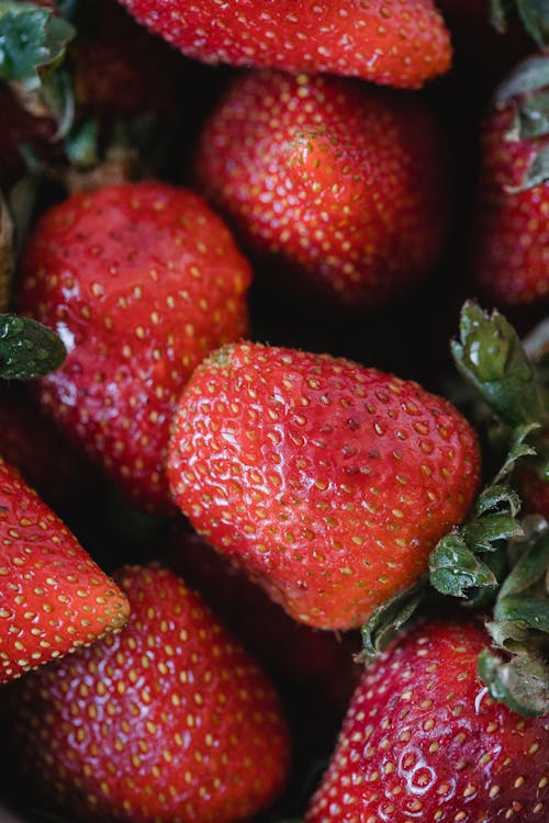 Fresh Red Strawberries with Green Leaves