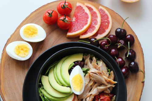 Breakfast board with eggs and fruit