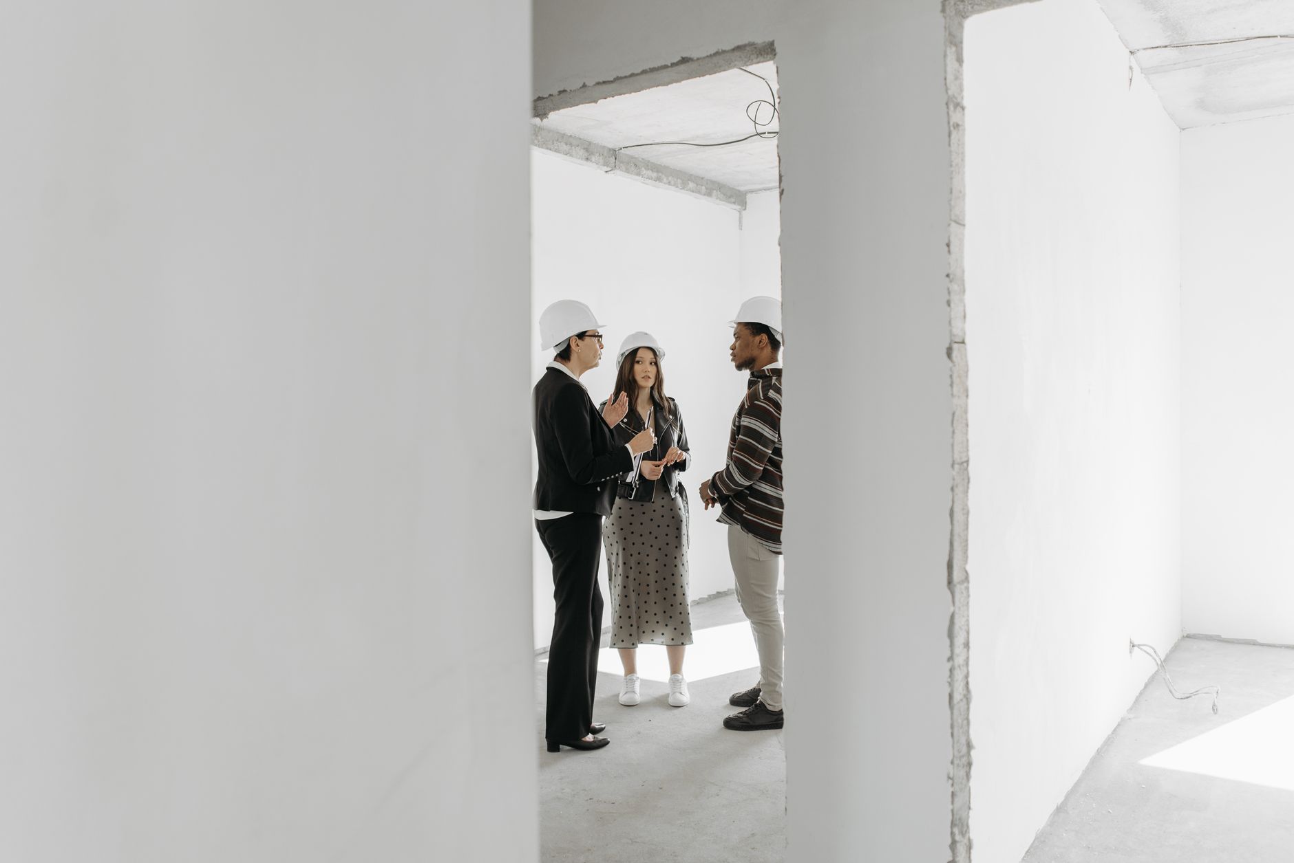 Realtor and Her Client Having a Conversation in the Room