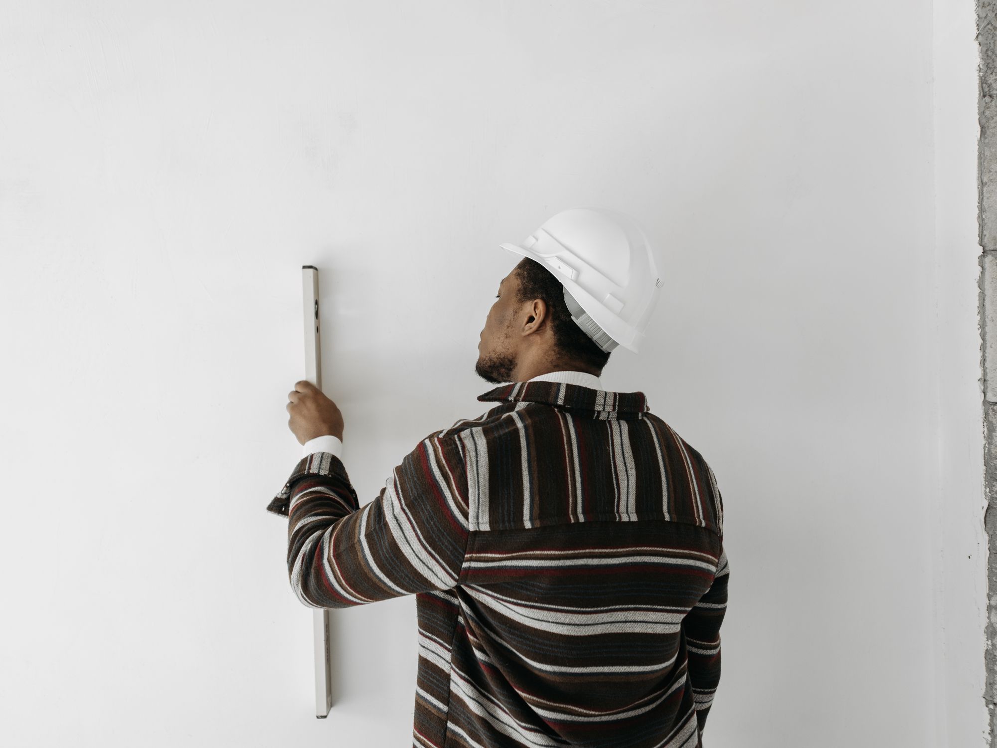 Plastering and Skimming in Shacklewell, Hackney — professional painter and decorator at work
