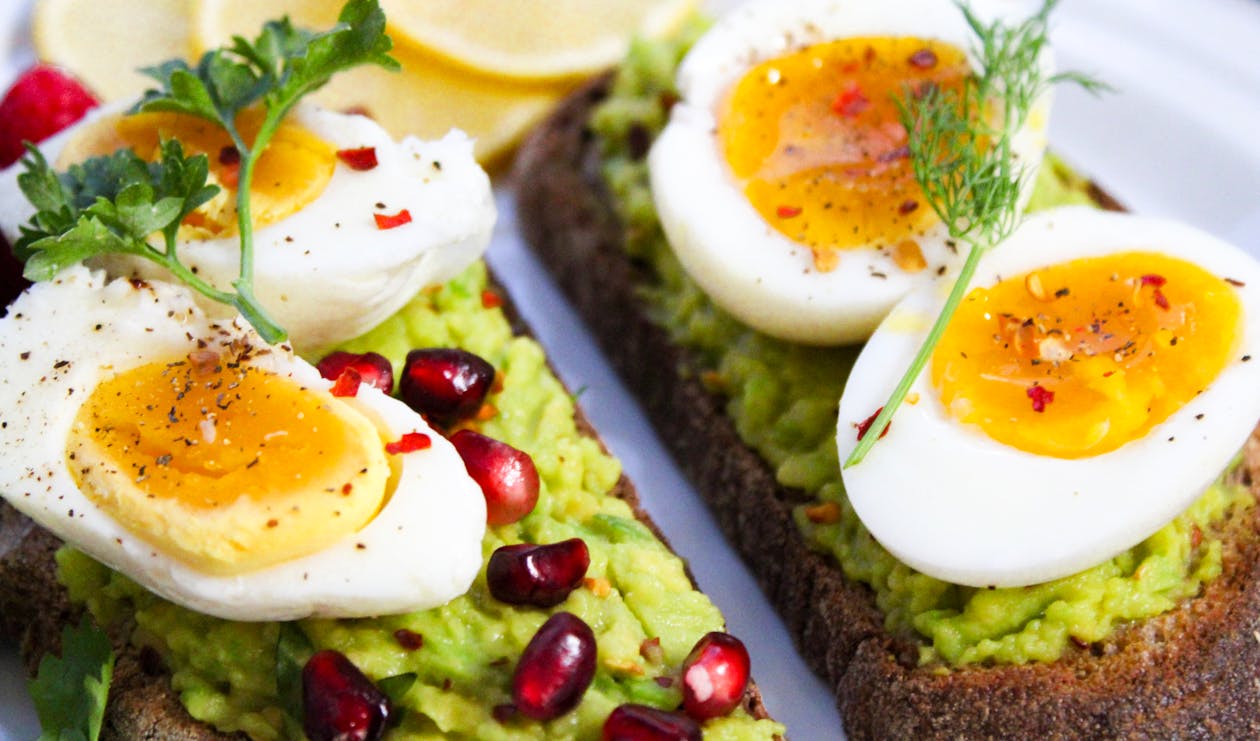 Breakfast - Slice of bread with eggs and avocado