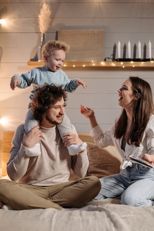 Free Happy Family During Bedtime Stock Photo