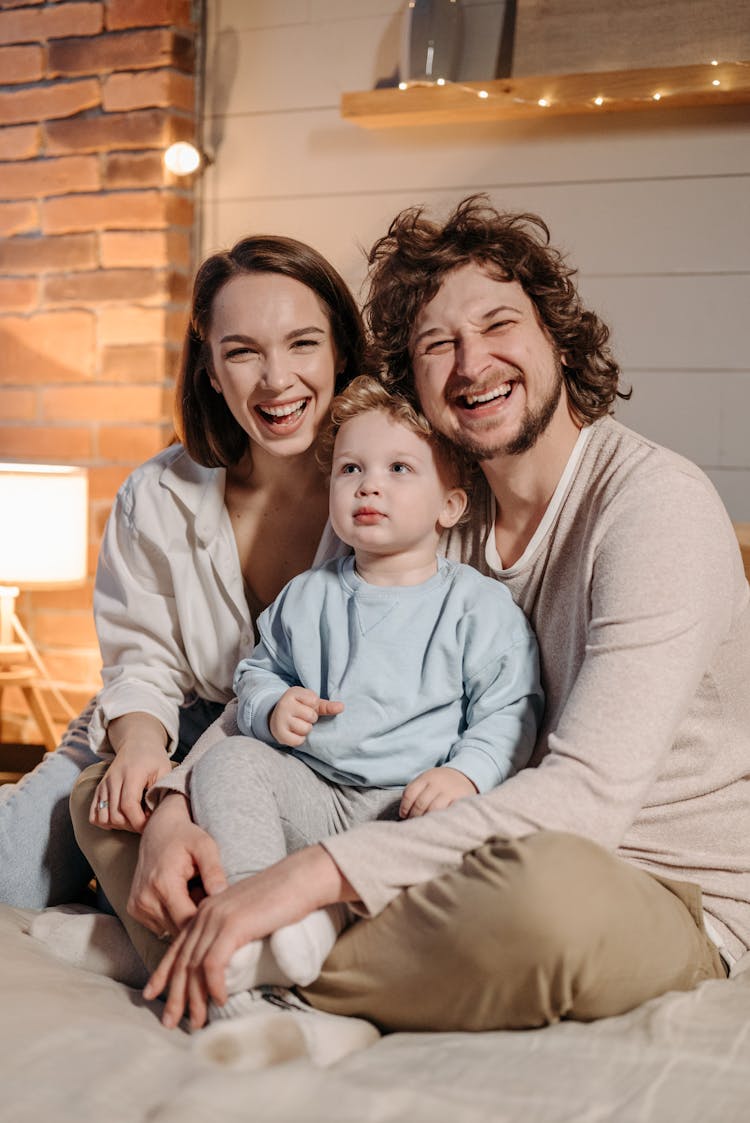 Photo Of A Family Smiling