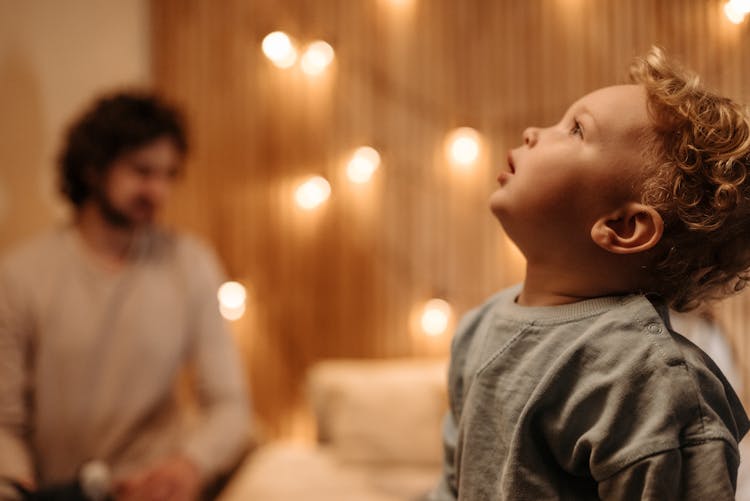 Photo Of A Toddler Looking Up