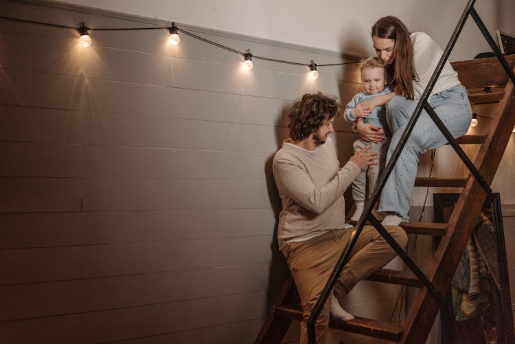 Family Sitting On Steps