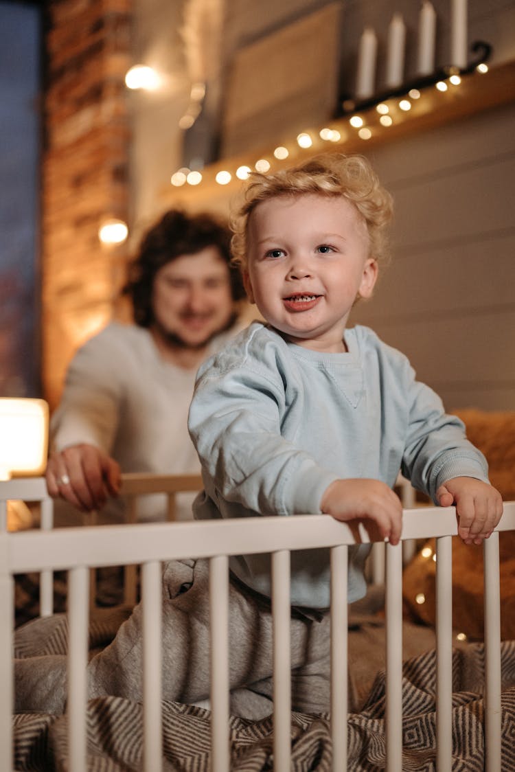  Toddler In The Crib Smiling