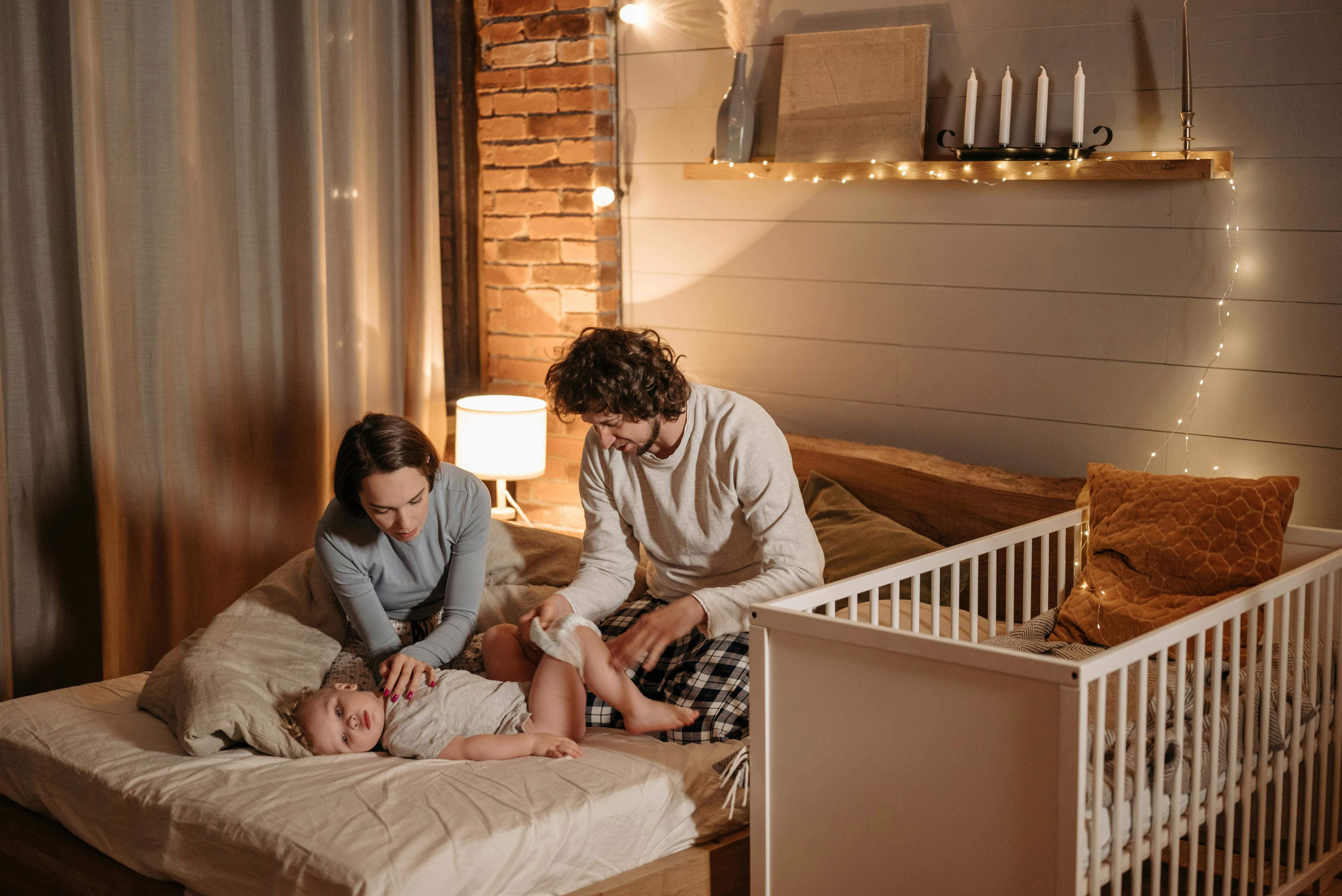 Family nursery with dresser with fold down changing table in use - dresser with fold down changing table