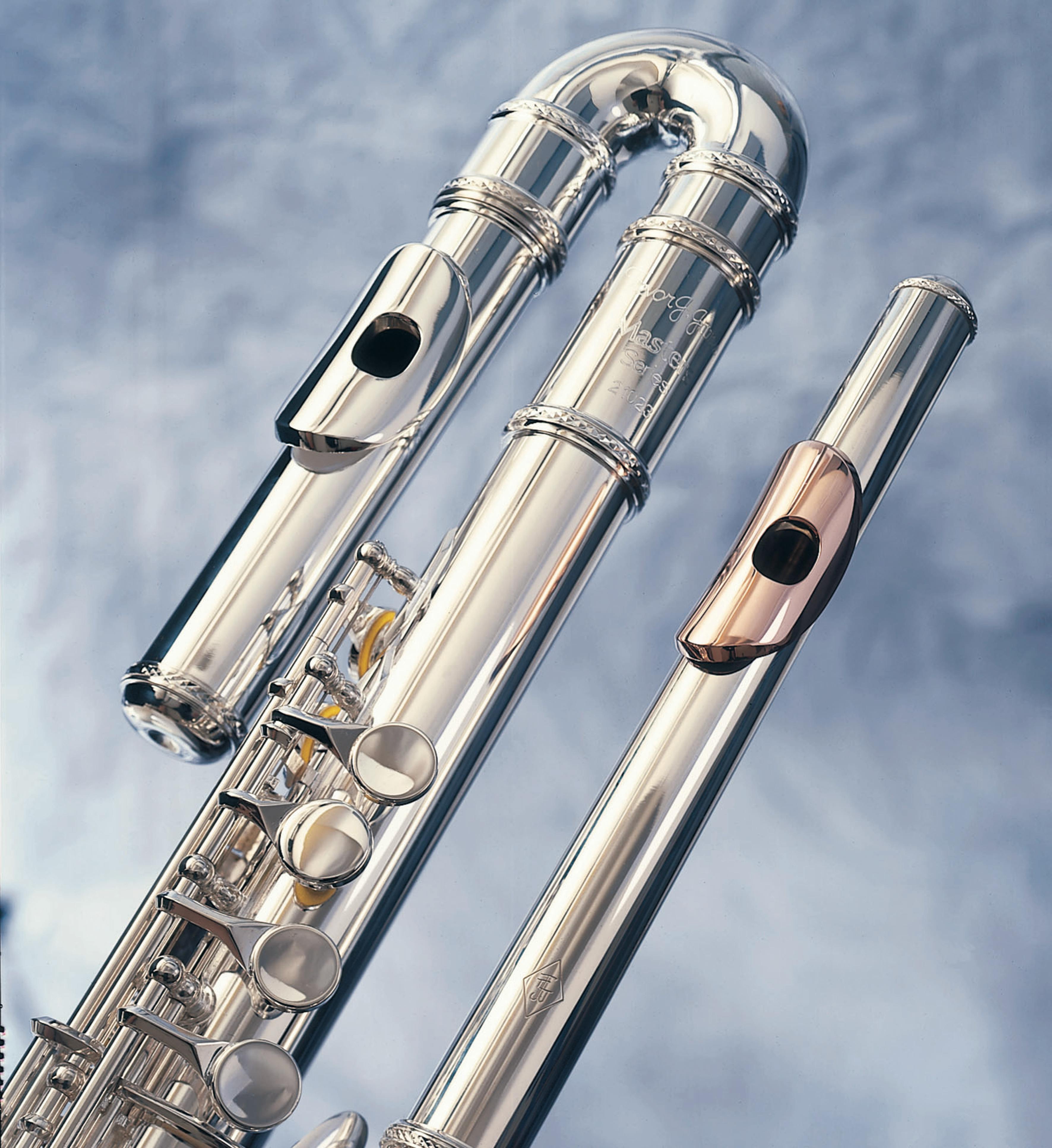 stainless musical instruments with gold and silver mouthpieces