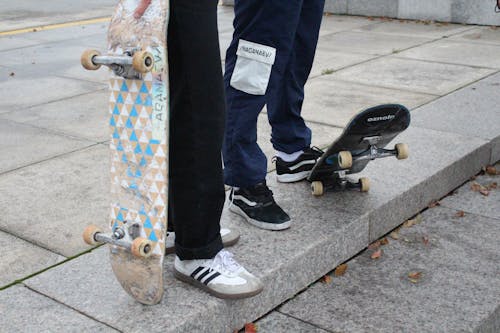 Photo of People with Skateboards