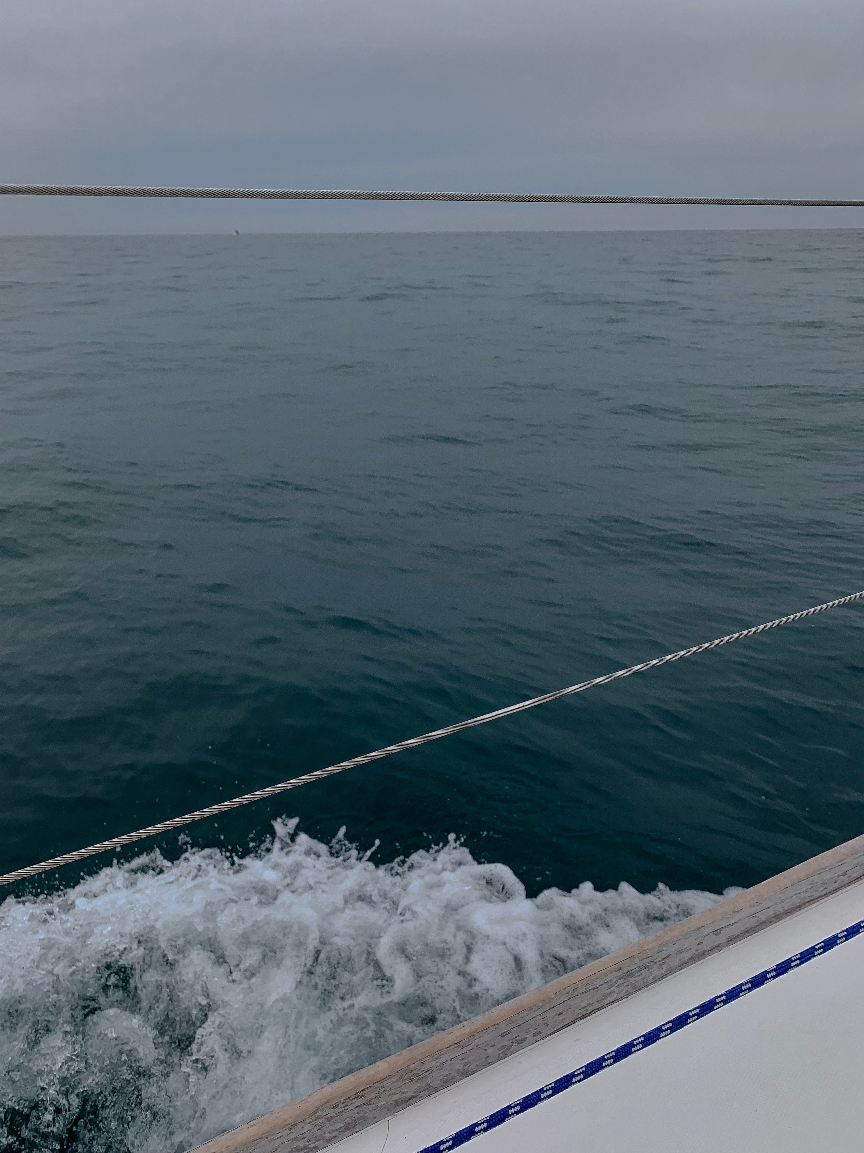 White Sailboat Under the Cloudy Sky · Free Stock Photo