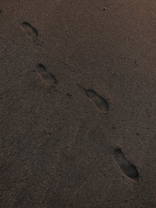 A Footprints on Brown Sand