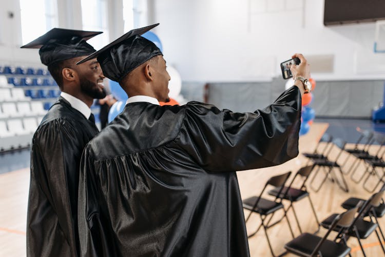 Photo Of Men Taking A Groupie