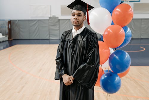 Photo of Man in Black Academic Gown