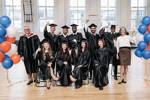 Free Photo of Fresh Graduates Posing for the Camera Stock Photo