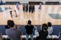 Photo of People Gathered Inside Gymnasium