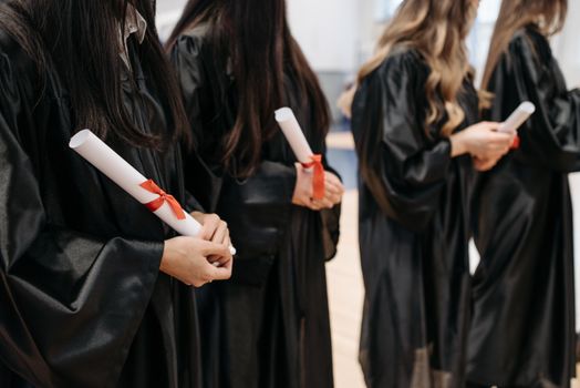 Photo of People Holding Diploma 
