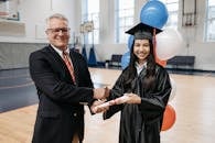 Photo of People Shaking Hands