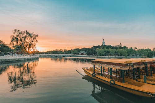 Boats on a Lake during Sunset