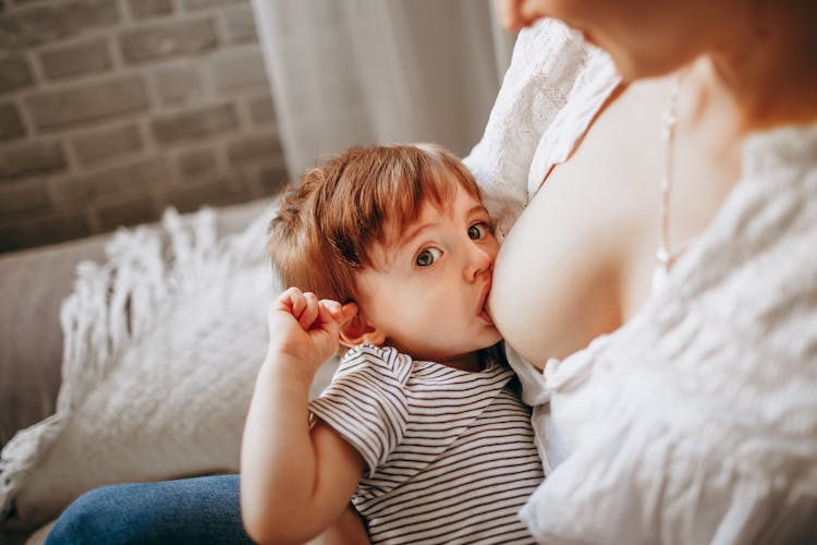 Woman Breastfeeding Her Baby