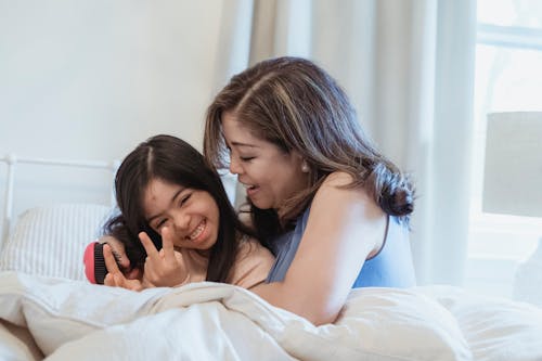 Free Mom Hugging Her Daughter Stock Photo