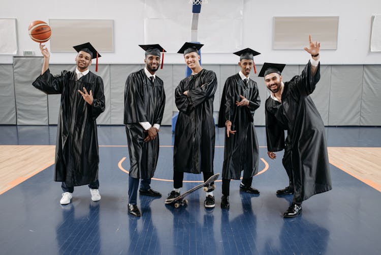 Photo Of Men In Black Graduation Gown 