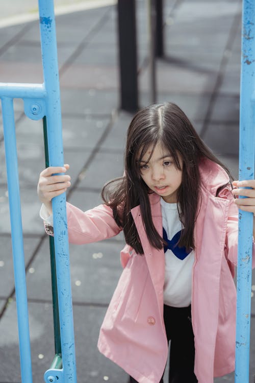 Photo of a Girl in a Pink Jacket