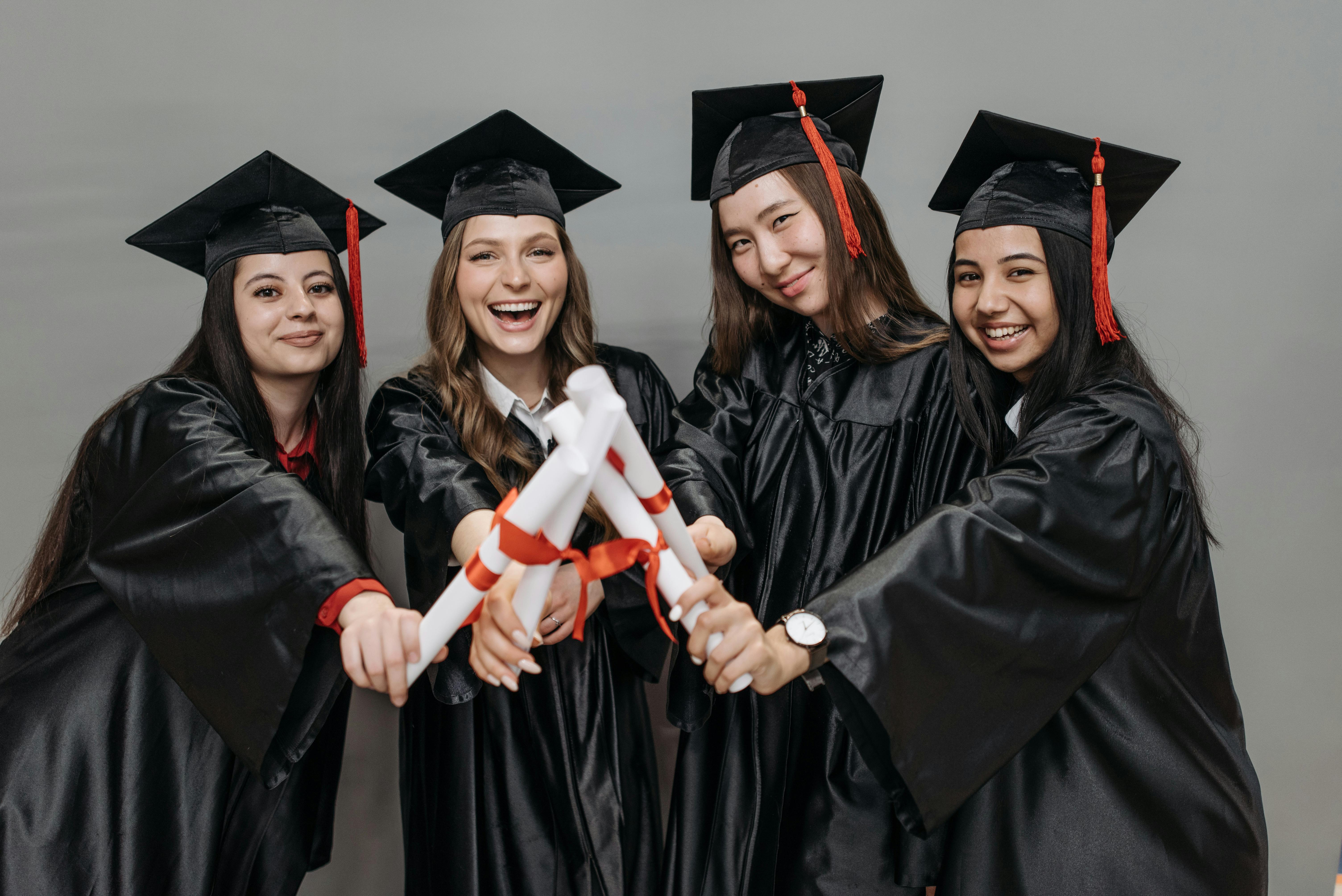 photo of women holding diploma