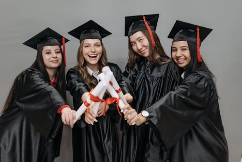 Free Photo of Women Holding Diploma Stock Photo