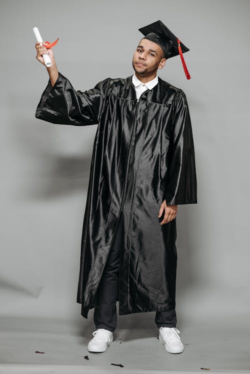 Photo of Man in Black Academic Dress