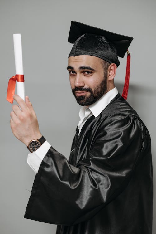 Photo of Man in Black Academic Gown · Free Stock Photo