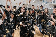 Photo of Fresh Graduates Celebrating in Gym