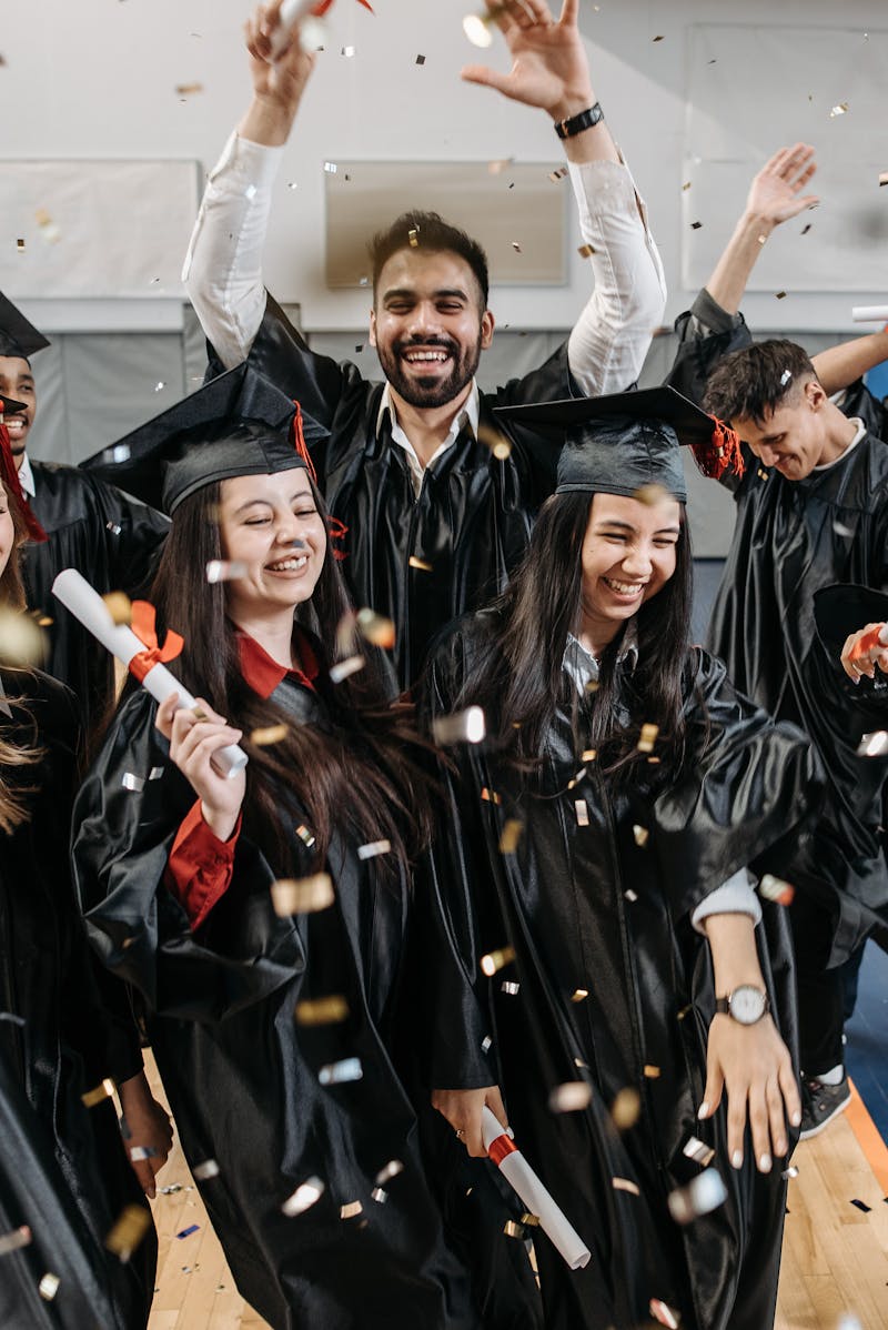 Graduate throwing cap during a celebration